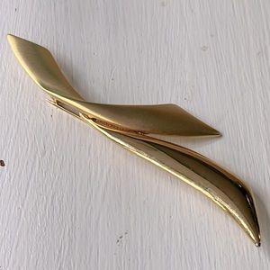 Tara gold toned brooch